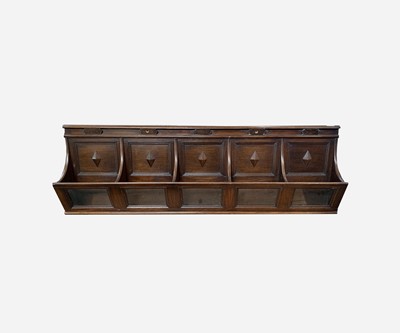 Lot 7 - An oak wall mounted stationery rack, circa...