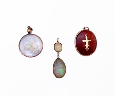 Lot 175 - Three pendants.