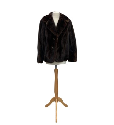 Lot 2819 - A dark mink jacket, silk lined, deep collar,...