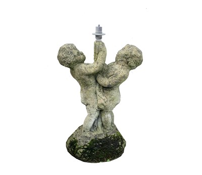 Lot 610 - A reconstituted stone water feature modelled...
