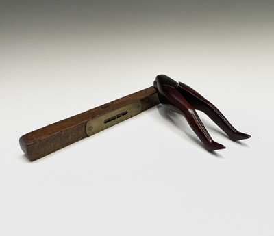 Lot 187 - A treen nutcracker, circa 1900, formed as a...