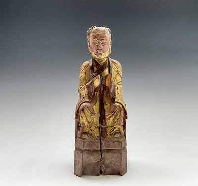 Lot 393 - A Chinese gilt carved wood and painted figure...