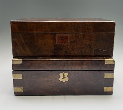 Lot 587 - A Victorian mahogany and brass bound writing...
