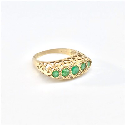 Lot 2433 - An 18ct gold pierced Victorian style ring set...