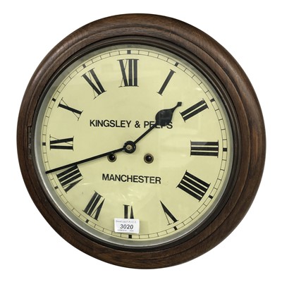 Lot 3020 - A oak circular wall clock, the dial inscribed...