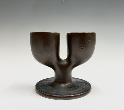 Lot 1120 - A Troika pottery double egg cup, brown glaze...