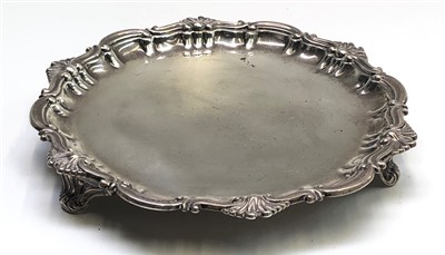 Lot 2147 - An Edwardian silver card tray with shell and...