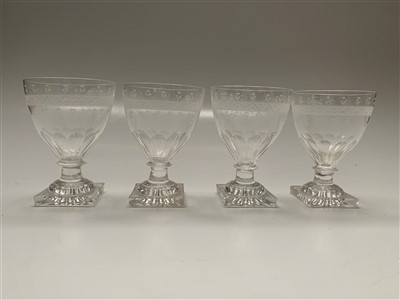 Lot 974 - Four Regency glass rummers, each with etched...