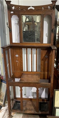 Lot 3322 - An Arts & Crafts oak hall stand.