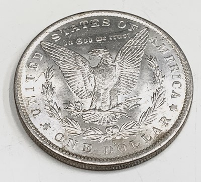 Lot 25 - USA Morgan Silver Dollars. A run of four US...