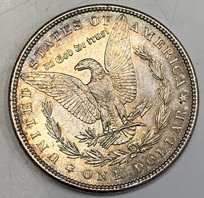 Lot 25 - USA Morgan Silver Dollars. A run of four US...