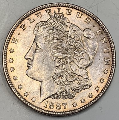 Lot 25 - USA Morgan Silver Dollars. A run of four US...