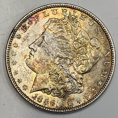 Lot 25 - USA Morgan Silver Dollars. A run of four US...