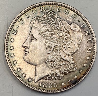 Lot 25 - USA Morgan Silver Dollars. A run of four US...