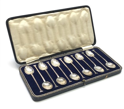Lot 2180 - A set of 12 silver coffee spoons with seal...