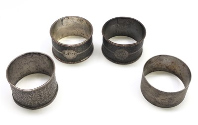 Lot 2188 - A pair of silver engine turn napkin rings, a...