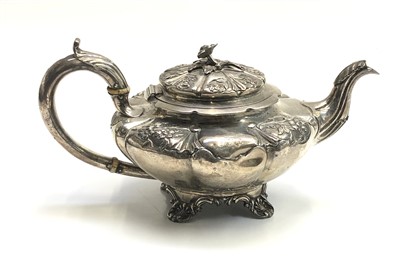 Lot 2195 - A William IV melon form fluted teapot with...