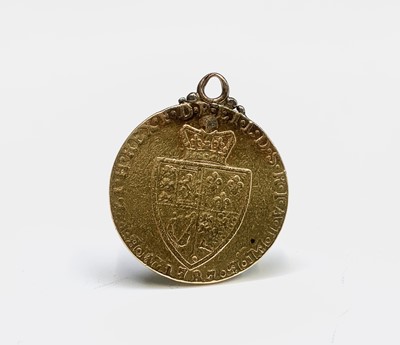 Lot 21 - A George III Spade guinea 1787 mounted as a...