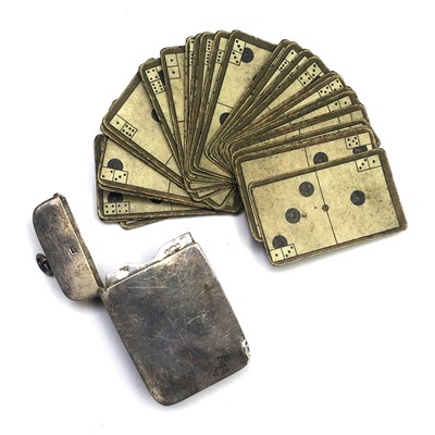 Lot 2702 - A rare dominoes set, the plain silver pocket...