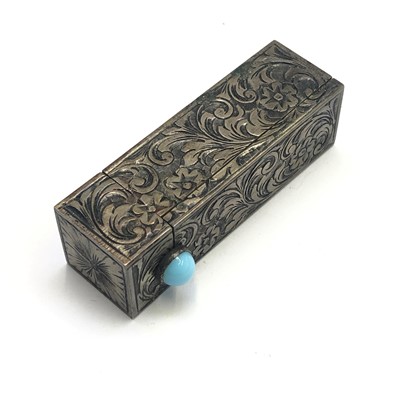 Lot 2708 - An engraved silver lipstick case with a sprung...