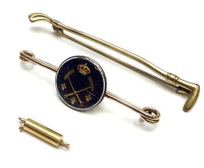 Lot 2479 - An enamelled Polo Club gold brooch, a riding...