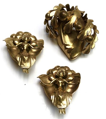 Lot 2480 - A gilt metal, female mask brooch and a pair of...