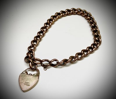 Lot 746 - A 9ct gold curb link bracelet with padlock clasp.
