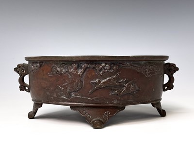 Lot 326 - A Japanese bronze twin handled censer, Meiji...