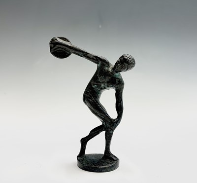 Lot 60 - A small bronze figure of an athlete throwing a...