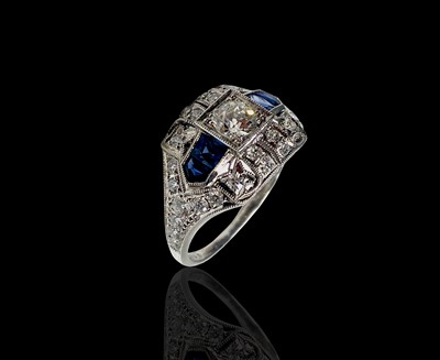 Lot 142 - A Sophia platinum diamond and sapphire ring 4.1gm