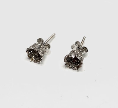 Lot 121 - A pair of platinum, diamond-set crown...