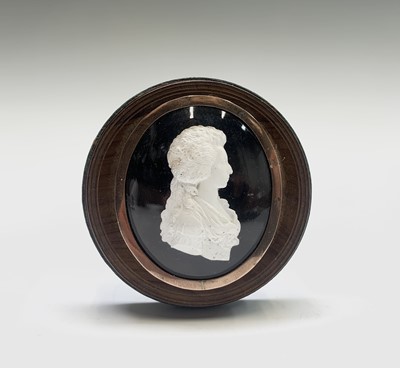 Lot 59 - An 18th-century white relief portrait possibly...