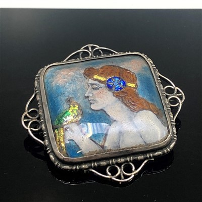 Lot 2582 - An Arts and Crafts enamelled sliver brooch,...