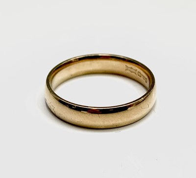 Lot 249 - An 18ct gold band 3.9gm and a 9ct gold dress...