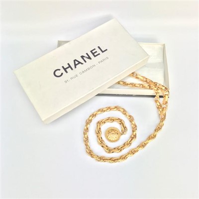 Lot 2597 - A Chanel gilt metal belt, Chanel box.