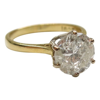 Lot 2796 - A solitaire diamond ring set in 18ct yellow...