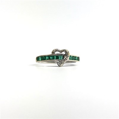 Lot 2750 - An 18ct white gold ring, set with a half hoop...