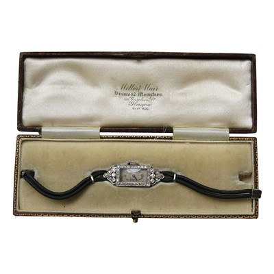 Lot 2792 - A cocktail watch, the rectangular platinum...