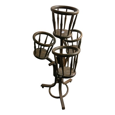 Lot 3418 - A bentwood jardiniere stand, height 110cm.