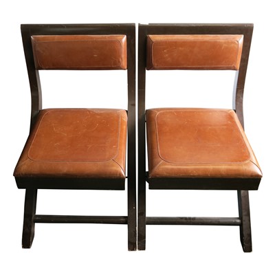 Lot 3426 - A pair of mahogany folding campaign chairs.