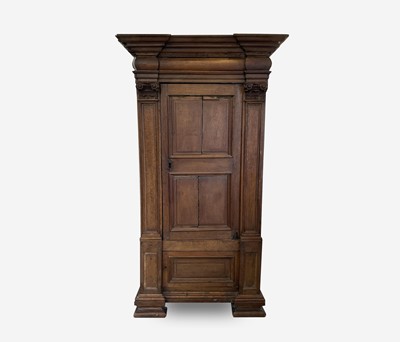 Lot 323 - A Continental oak hall cupboard, late 18th...