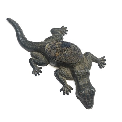 Lot 2610 - A late Victorian cast white metal lizard pin...