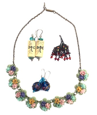 Lot 2611 - An unusual coloured plastic necklace together...