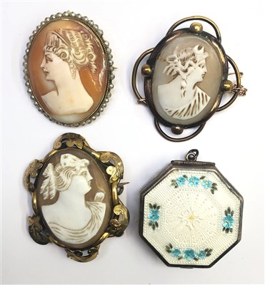 Lot 2612 - Three cameo brooches and an enamelled silver...