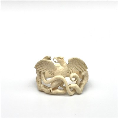 Lot 2615 - A 19th century carved bone snake and eagle ring.