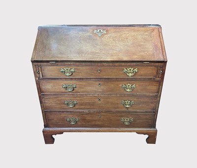Lot 3017 - A George III mahogany bureau, the fall front...