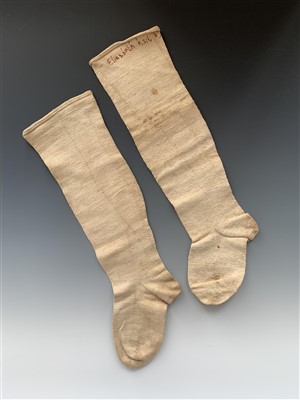 Lot 3219 - A pair of George III finely knitted cream wool...