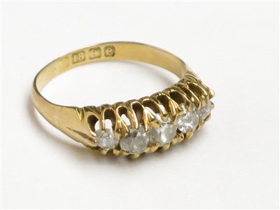Lot 2434 - An 18ct gold late Victorian gold ring set five...