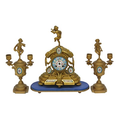 Lot 3003 - A French gilt metal and porcelain clock...