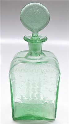 Lot 989 - An early 20th century green glass scent bottle,...